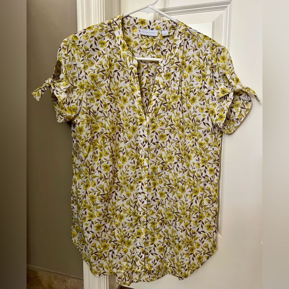 NY and Company button down top with tie sleeves. Size S